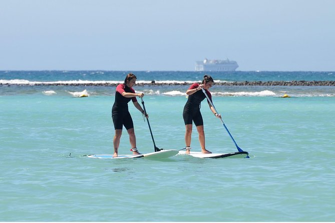 1,5-Hour Beginners Stand Up Paddle Course in Caleta de Fuste - The lesson flow: land basics first, then controlled time on the water