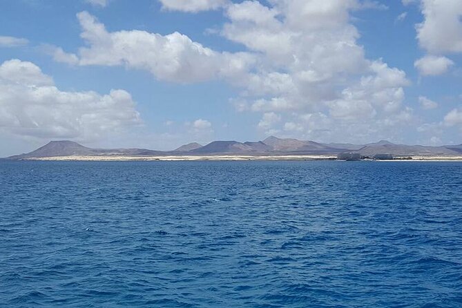 3-Hour Small-Group Sailing Tour around the Lobos Island - Isla de Lobos anchor stop: swimming, snorkeling, SUP, and kayak time