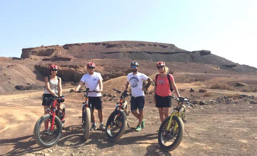 Caleta de Fuste/Corralejo: Guided E-Bike Tour & Crater Hike - Price and value: $77 for bike, helmet, guide, and insurance