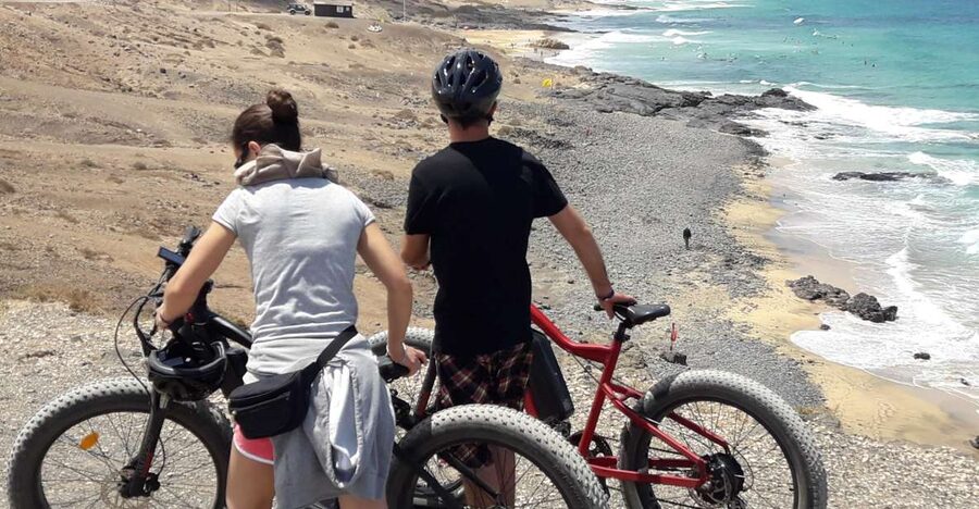 Caleta de Fuste/Corralejo: Guided E-Bike Tour & Crater Hike - Corralejo–Lajares: the day feels like a lunar movie set