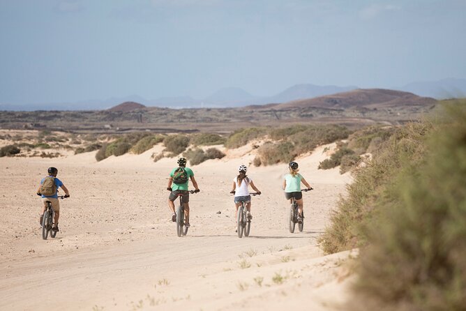 Coast to Coast PREMIUM eBike Tour; moderate level - 45 km - Guide style: fast setup, real local talk, and a calm pace