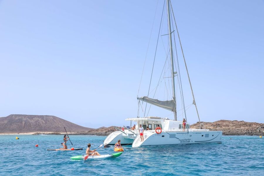 Corralejo: Adults-Only Catamaran Day Trip to Lobos Island - Sailing past La Caldera and the El Río arm before La Concha
