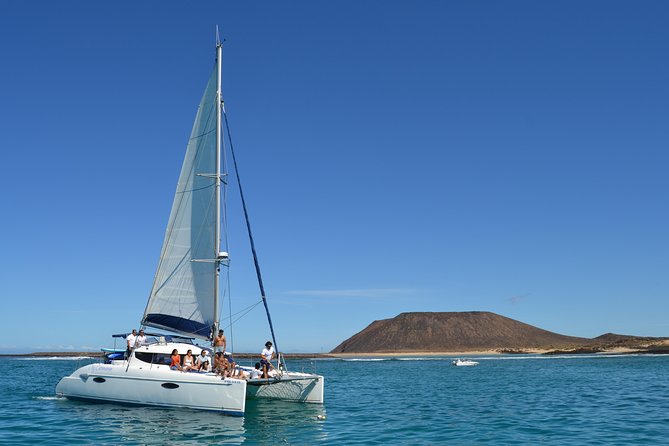 Exclusive Sailing Catamaran Experience to Lobos Island with lunch - Snorkeling, kayak, and stand-up paddle: included gear and real practice time