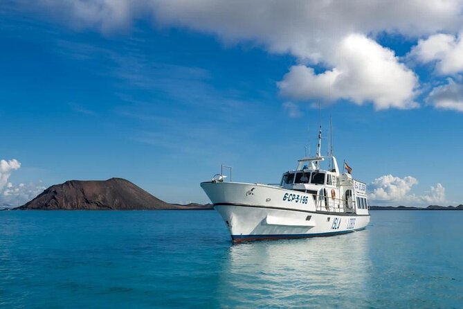 Ferry to Isla de Lobos: round-trip tickets from Corralejo - First Stop at El Puertito: Protected Park Views and Volcanic Coasts