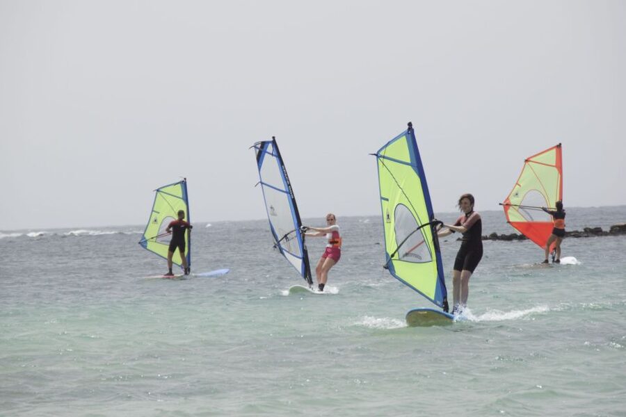 From Corralejo: Small Group Windsurfing Class in El Cotillo - Corralejo Pickup To El Cotillo Lagoon: The Day in Plain Terms