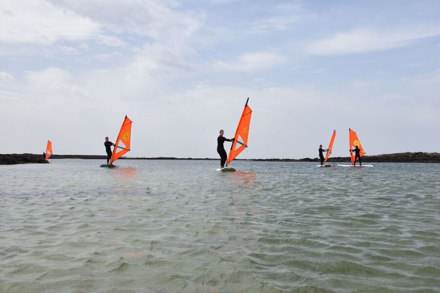 From Corralejo: Small Group Windsurfing Class in El Cotillo - Getting Your Gear Right: Board, Sail, Wetsuit, and Boots