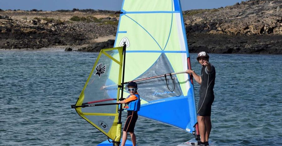 From Corralejo: Small Group Windsurfing Class in El Cotillo - First Glides on Flat Water: Learning Without Waves or Currents