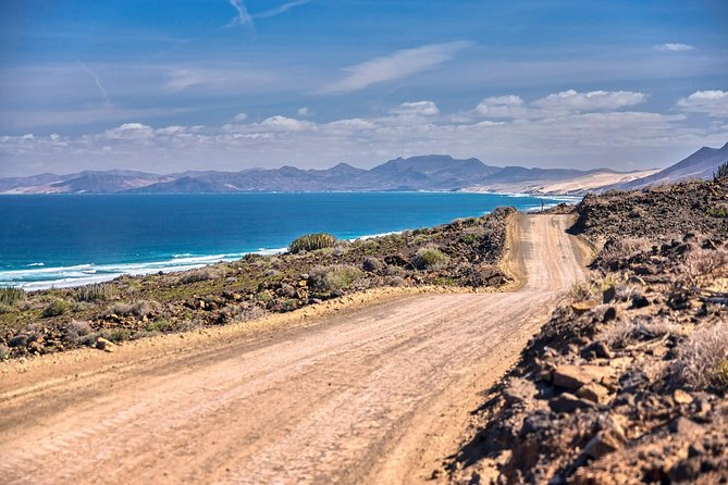 Fuerteventura: Cofete Beach and "Villa Winter" VIP Tour - Guide quality in the real world: English on paper, translation in practice