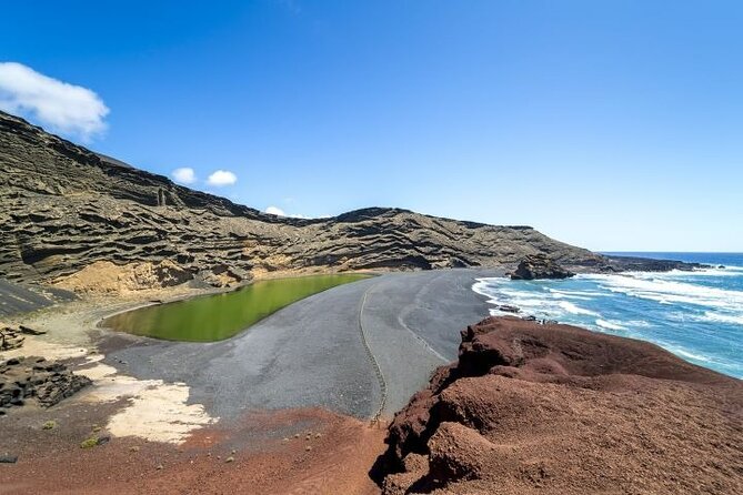 Lanzarote Volcanoes Tour departing from Fuerteventura - El Golfo: the green lagoon behind the black sand