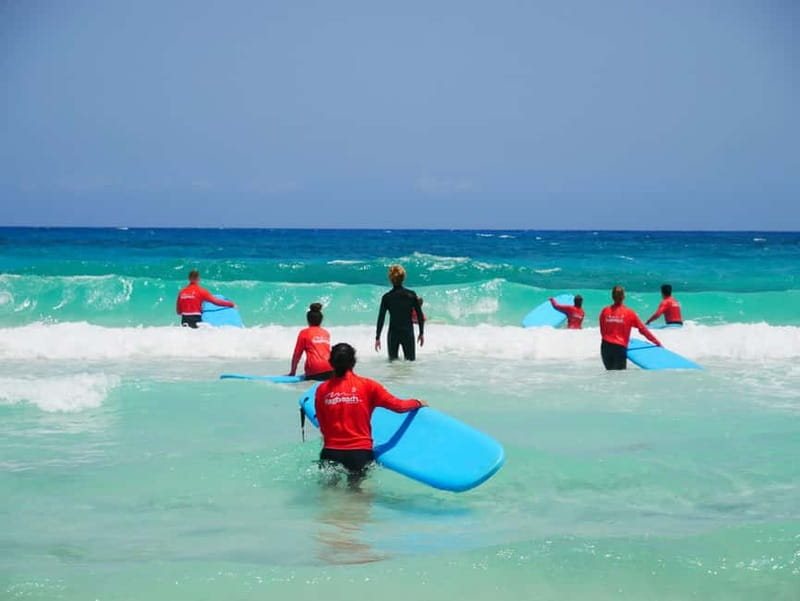 Learn to Surf in the north of Fuerteventura! - The day plan: pickup, gear, beach warm-up, and straight-to-practice energy